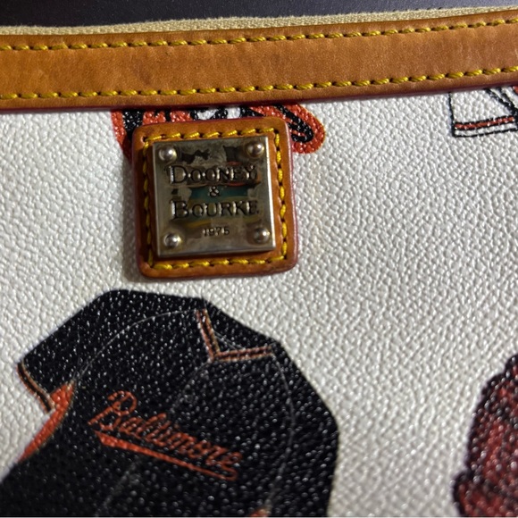 Dooney & Bourke Sports-Themed Wristlet with Black and Brown Accents - Picture 2 of 8